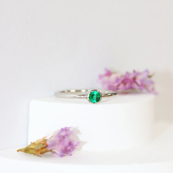 Ethically-sourced Platinum Solitaire Emerald May Birthstone Ring