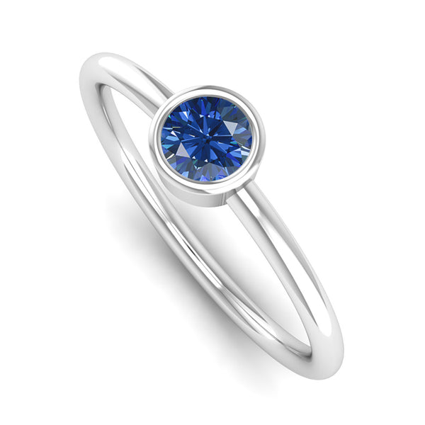 Ethically-sourced Platinum Solitaire Tanzanite December Birthstone Ring, Jeweller's Loupe