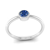 Ethically-sourced Platinum Solitaire Tanzanite December Birthstone Ring, Jeweller's Loupe