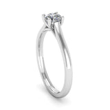 Solitaire Round Brilliant Cut Diamond Engagement ring with a Kiss Setting - Jeweller's Loupe